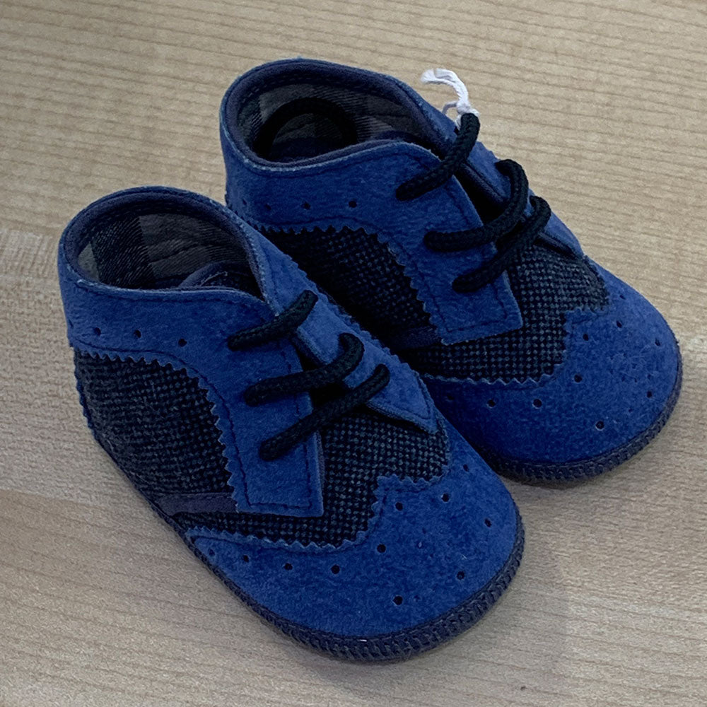 
  Schuhe aus der Ambarabà Kinderkleidungslinie, aus sehr weichen Materialien und
  mit Handwerks...