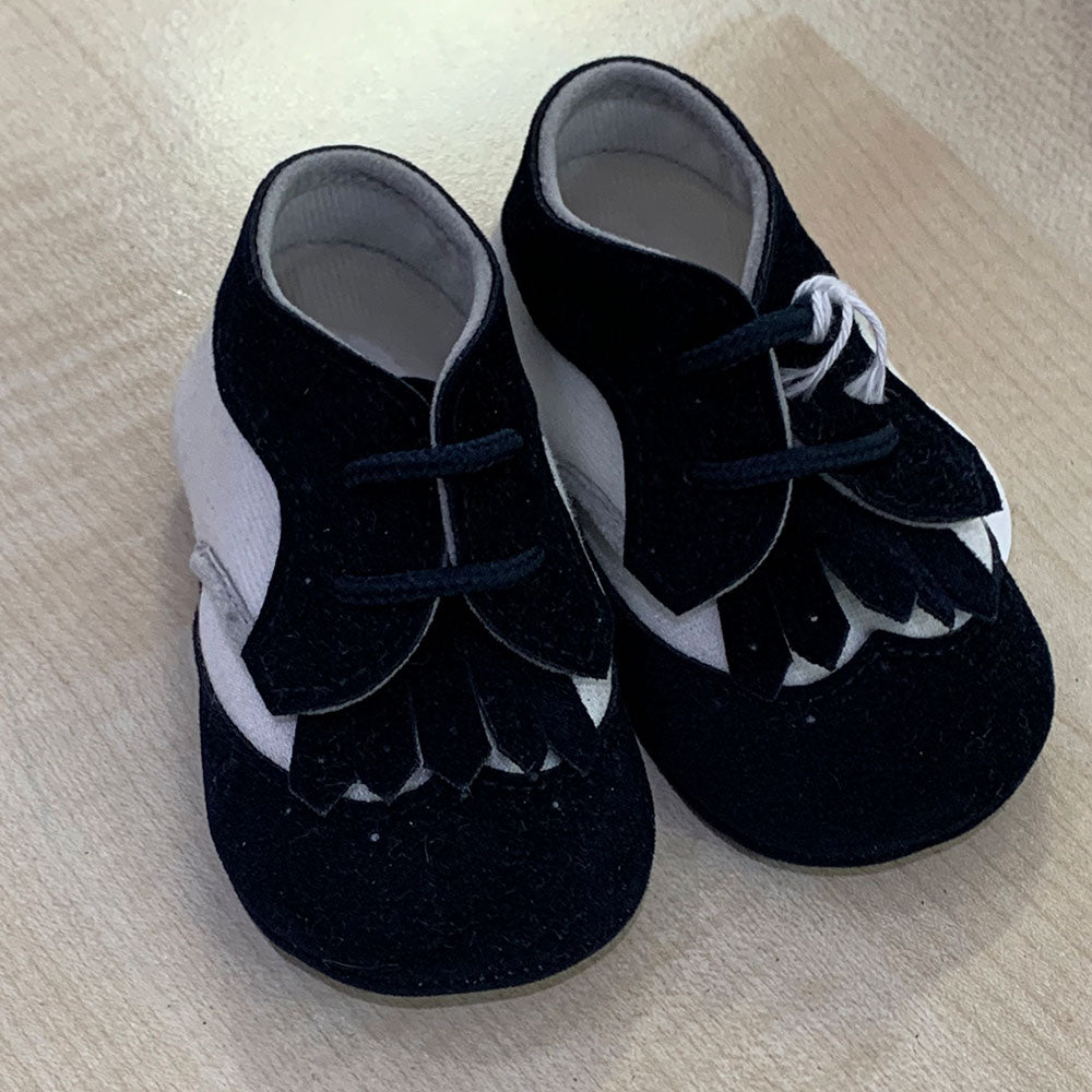 
  Schuhe aus der Ambarabà Kinderkleidungslinie, aus sehr weichen Materialien und
  mit Handwerks...